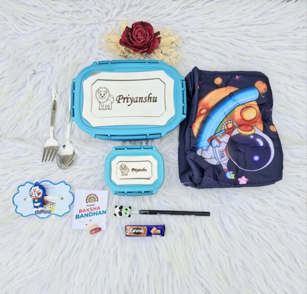 2025/07/1005902325.jpg Kids Lunch Box Rakhi Combo
